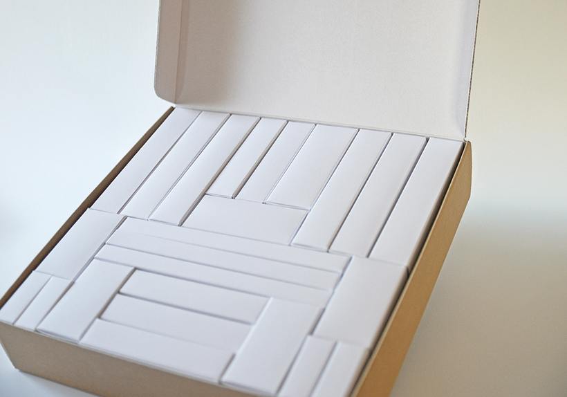 Calendario dell'Avvento personalizzabile modello Brick con 24 astucci, in carta bianca